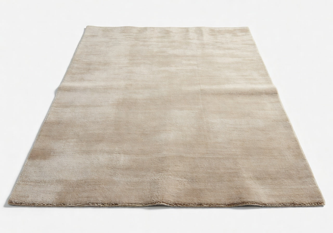 Elowen Solid Beige Rug